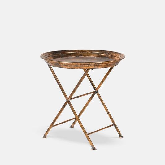 Round metal side table with antique copper finish and foldable legs.