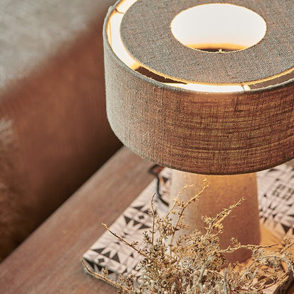 A mushroom shaped table lamp made entirely from linen adds a modern and luxury feel. 15% off your first order when you sign up, with easy returns.