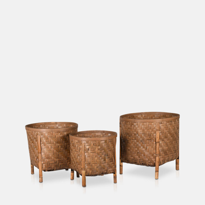 Set of three raised woven planters in different sizes