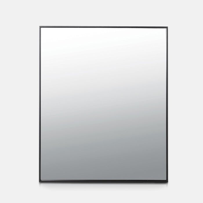 A cutout of the Winston Mirror, a large rectangular mirror with a thin black frame