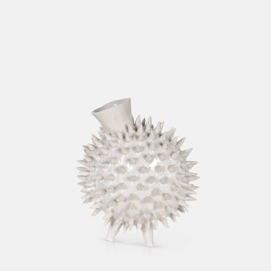 Cut out of a spike white ceramic vase with 3 ceramic feet and a bulbous shape and narrow neck. A contemporary looking vase perfect for the modern home. 