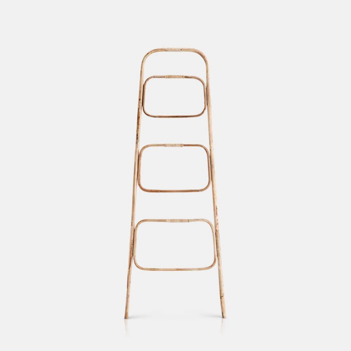 A cutout of the Arden Bamboo Ladder, a small delicate ladder in light bamboo.
