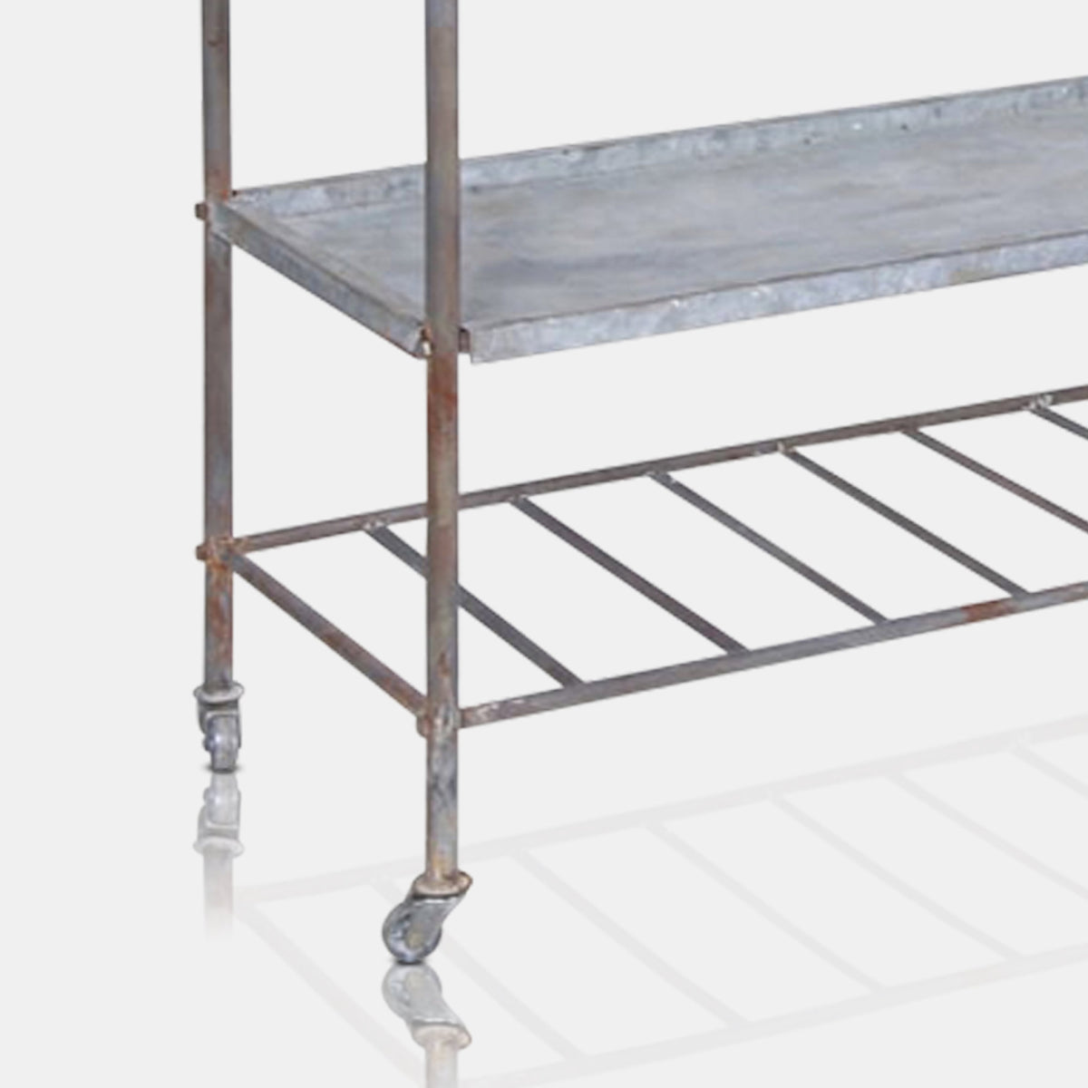 A closeup of the lower shelf on the Dolstin Drinks Trolley.