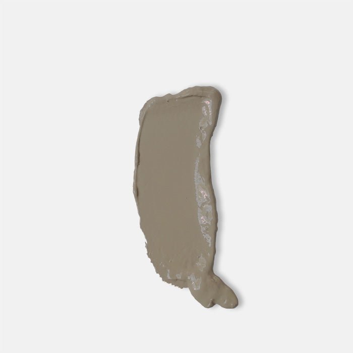 Heavy smear of a mid tone brown paint 