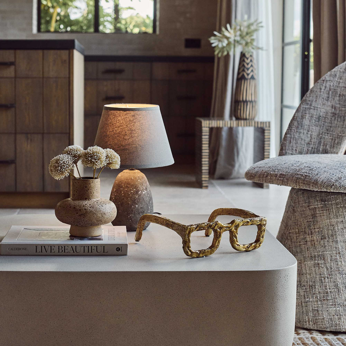 Elton sculpture gold glasses frame modern abstract home decor accent piece styled