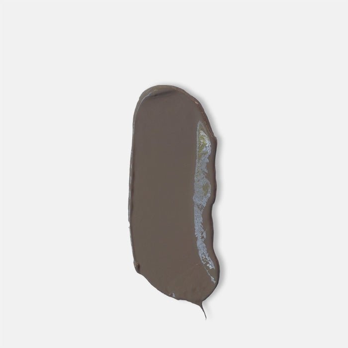 A smear of a mid tone brown paint