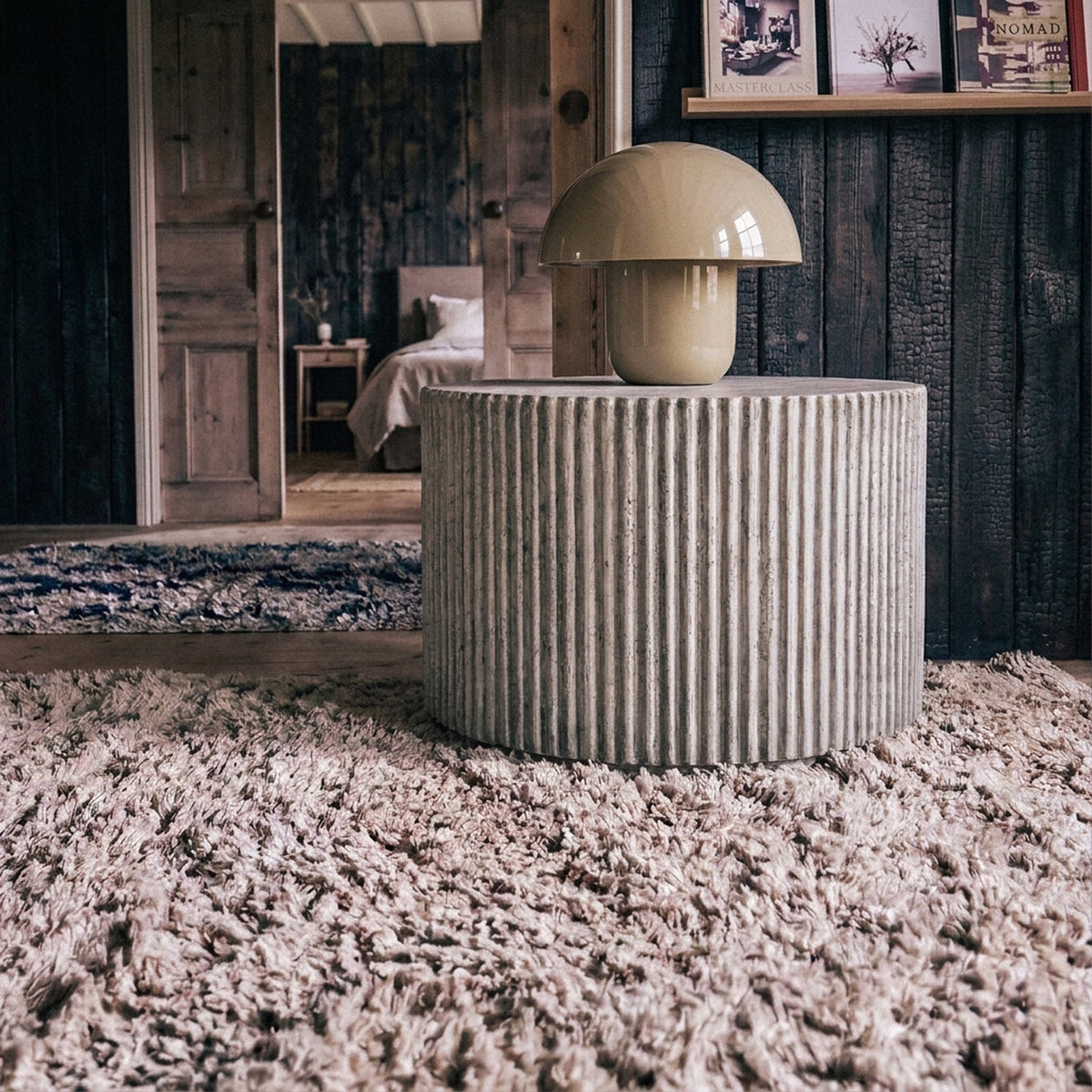 Abigail Ahern Hereford Stone Coffee Table in weathered grey concrete look surface with a sculptural ribbed design and natural stone-effect finish, styled as a statement living room coffee table or an alternative bedroom side table 