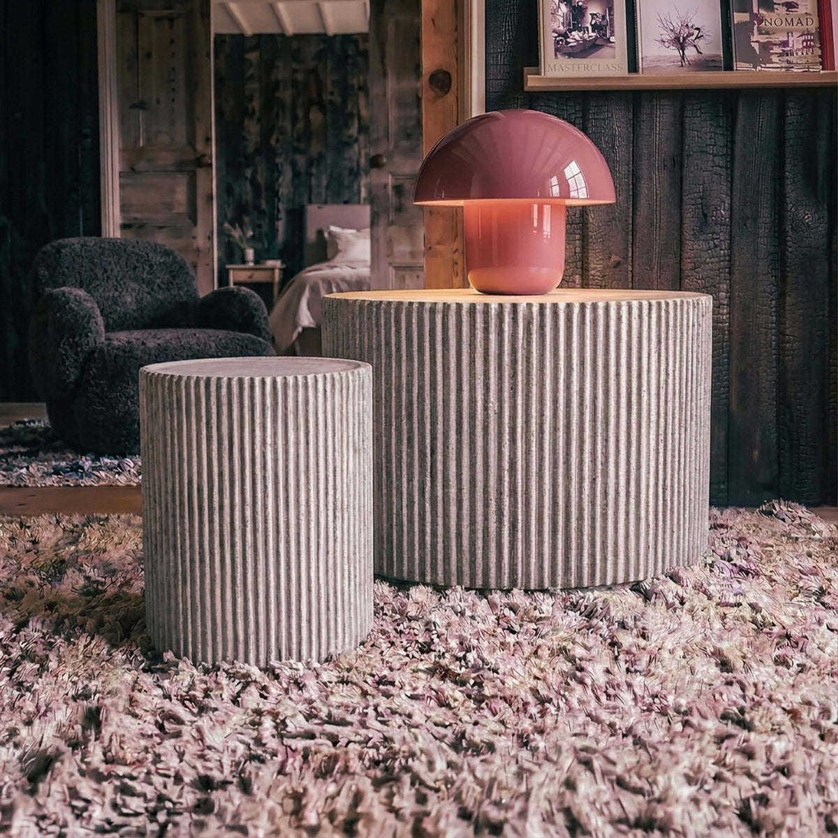 Abigail Ahern Hereford Stone Coffee Table featuring a weathered grey concrete look finish, sculptural curved textured stone-effect surface for contemporary interiors.