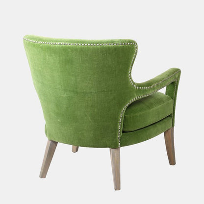 Image of the back of the apple green accent chair, with wooden legs, and a classic style of stud detailing. These types of accent chairs are a bold and fun way to add some colour to your room.