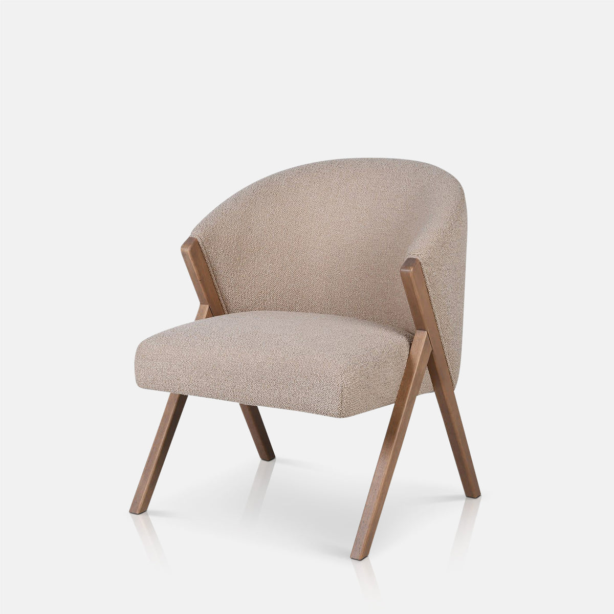 Abigail Ahern Lyndon Dining Chair in plush upholstery with a sculptural curved shape, for around a dining table or coffee table.