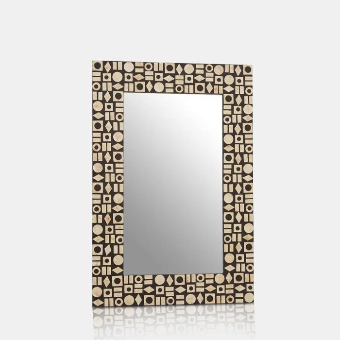 Palu Rectangular Mirror, made from durable composite, featuring a pearlescent frame with a pattern of mixed geometric shapes.