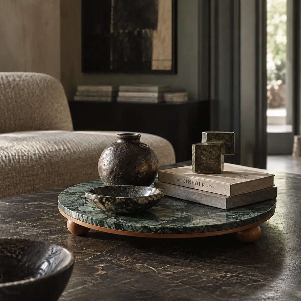 Remington decorative tray with a round green patterned surface and raised feet, styled with books, a small bowl and a vase on a dark coffee table.