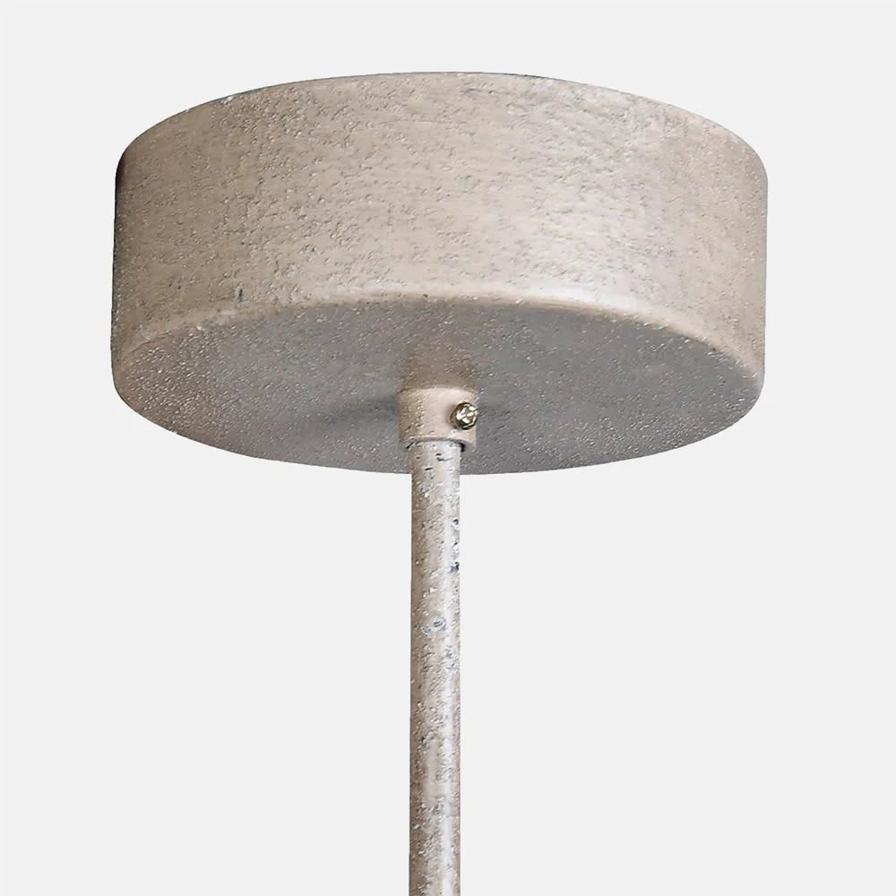 Roxham beaded chandelier ceiling fitting shown close up, highlighting its round neutral canopy, textured finish and slender hanging rod with a small visible fastening.