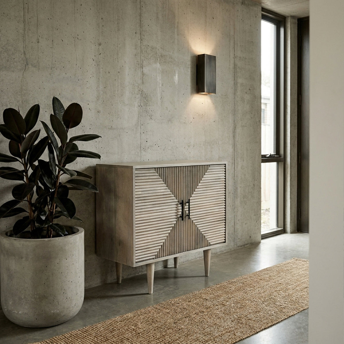 Abigail Ahern Rushmoor Wooden Sideboard in natural mango wood with carved geometric detailing across two doors, offering stylish storage for contemporary living rooms and hallways.