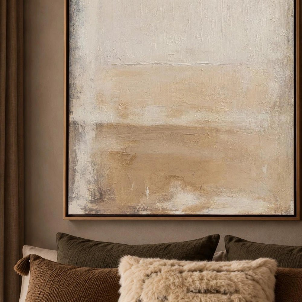 Serenity Canvas Art shown in a closer styled view above a wooden console, with a cream lamp, sculptural vessels and warm neutral interior details.