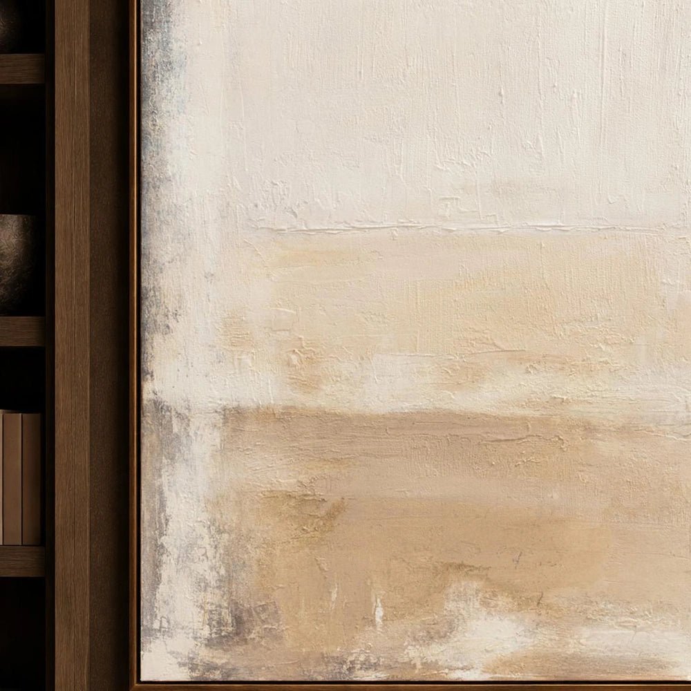 Serenity Canvas Art in a dark frame above a wooden sideboard, styled with sculptural lamps and vessels beside a warm neutral dining area.