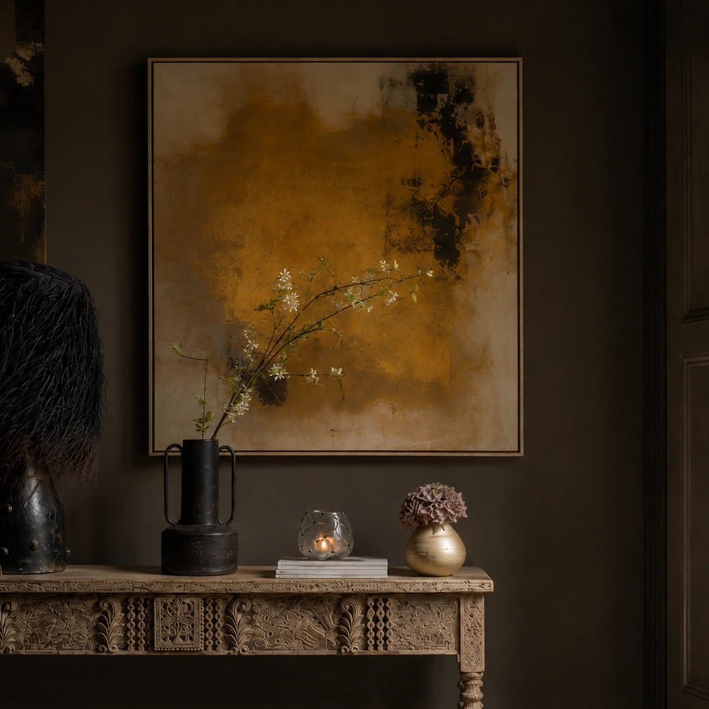 Solstice Canvas Art displayed above a dark wooden console, showing an abstract yellow composition with layered cream and black forms in a neutral interior.