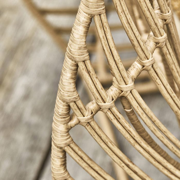 Close up image of the woven details that make up our wicker vidor lounge chair