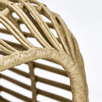Detail image of the wrapped design of this statement wicker chair, perfect for outdoor furniture.