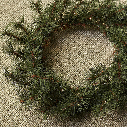 Christmas wreath with subtle twinkling lights.