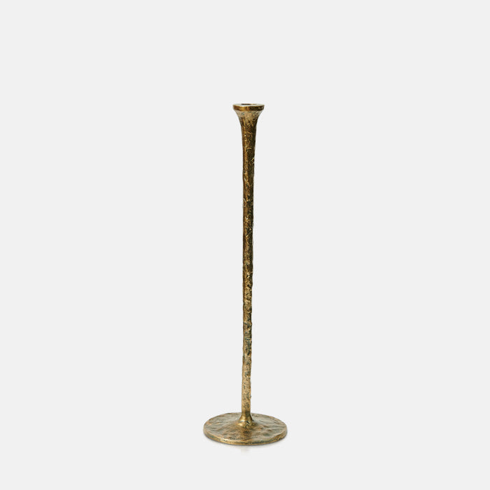 Tall brass candleholder with hammered texture.