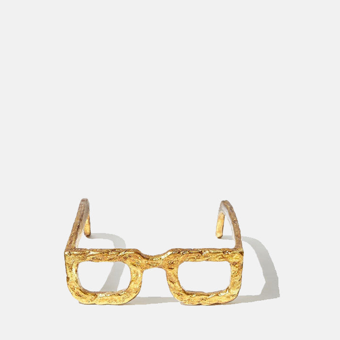 Square glasses shaped sculpture in gold