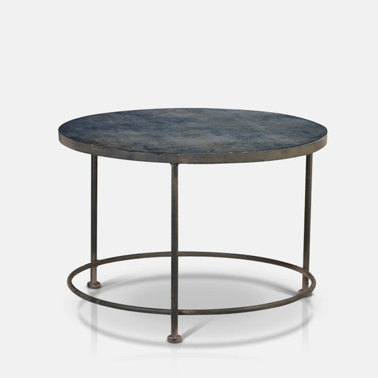 Blue printed glass coffee table with a round black frame 