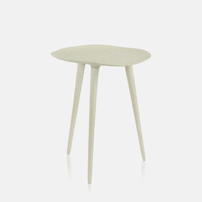 Small white side table with organic asymmetrical table top and three legs.