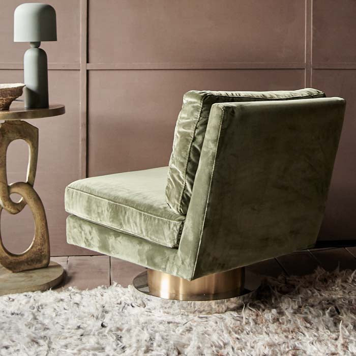 Olive green velvet chair with gold metal base.