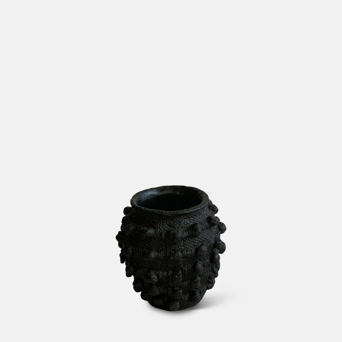 Small black vase with a bobble texture