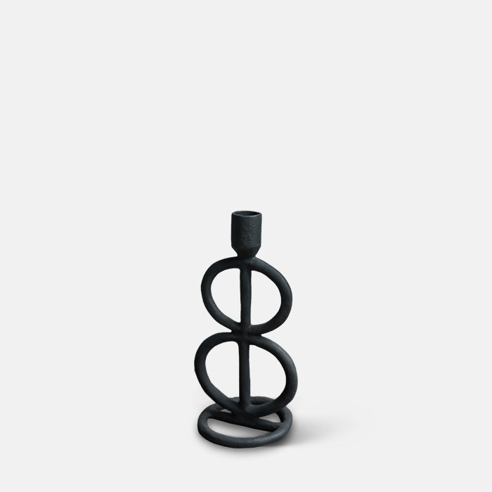 Sculptural black metal candleholders in a figure of eight shape 