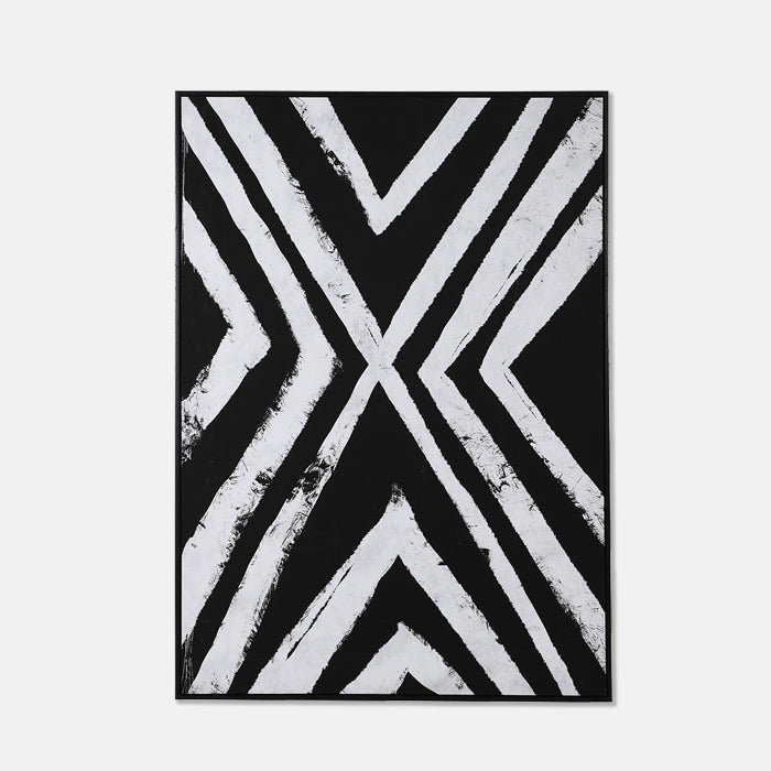 Rectangular canvas print of a black and white x in a thin black frame