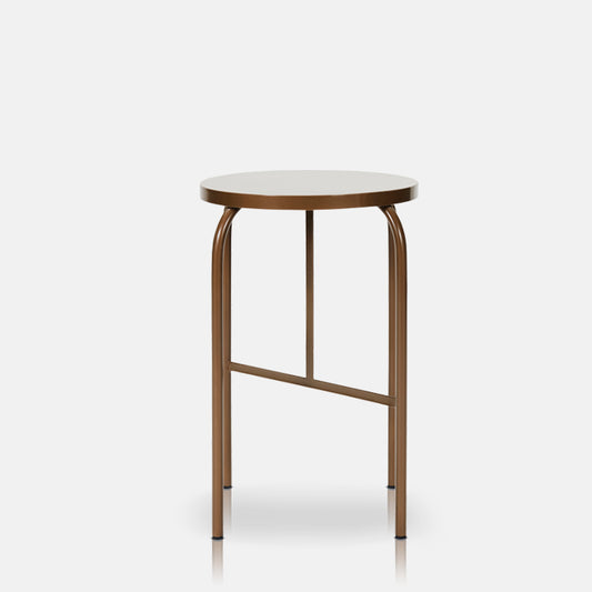 Low metal stool with four legs and round seat.